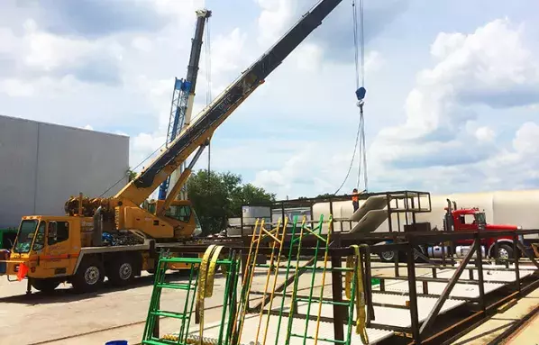 Unloading-of-custom-crated-boiler-panel-tubes--See-the-bends