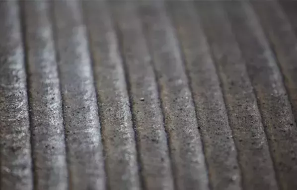 Close-up of a wear liner used to protect mining assets and extend service life of valuable equipment
